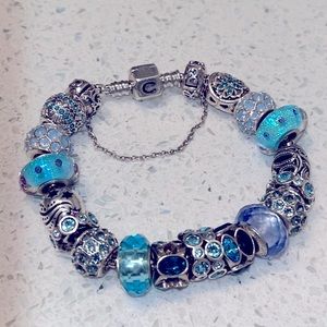 Authentic Chamilia Bracelet with assortment of charms